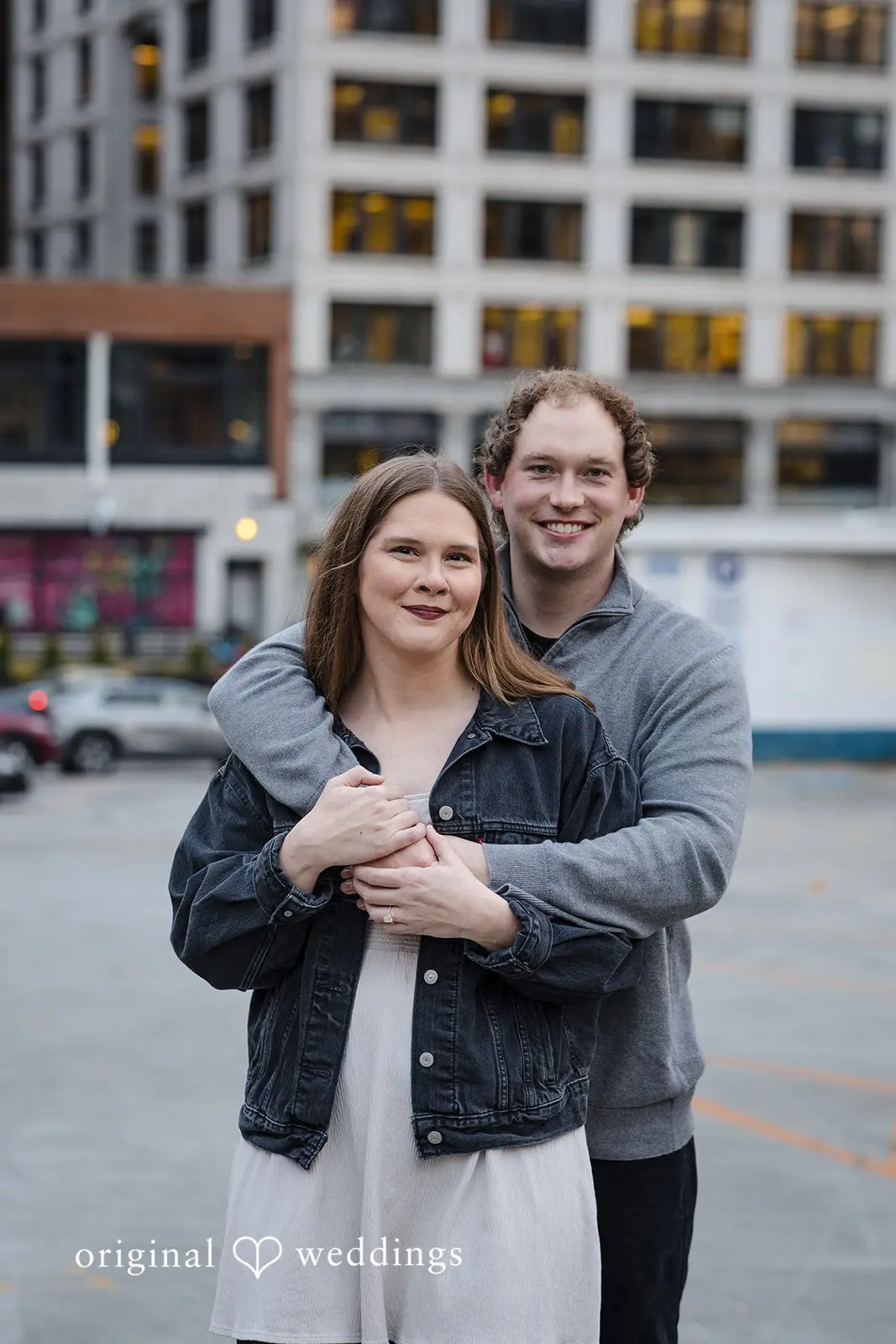A romantic portrait of the couple holding each other at Old Town Issaquah