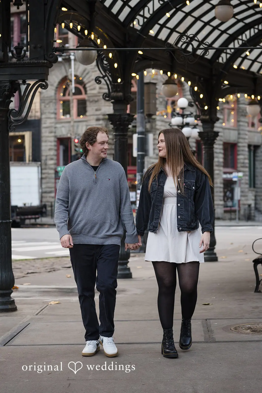 A close shot of the couple taking a walk in Old Town Issaquah
