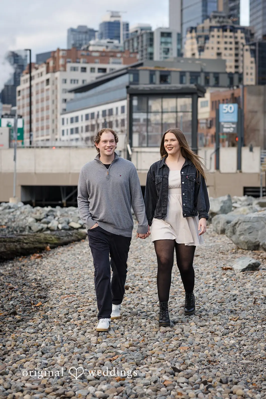 A portrait of the couple taking a walk through the rocky path in Old Town Issaquah