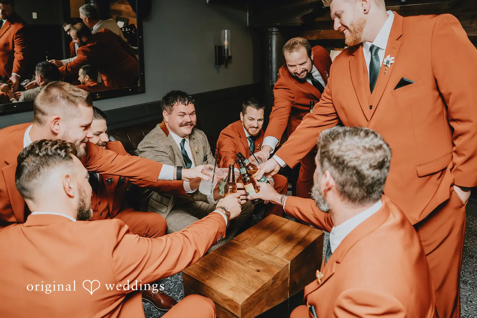 Hayden + Abby The groom and groomsmen having a wonderful time at Pritzlaff Events