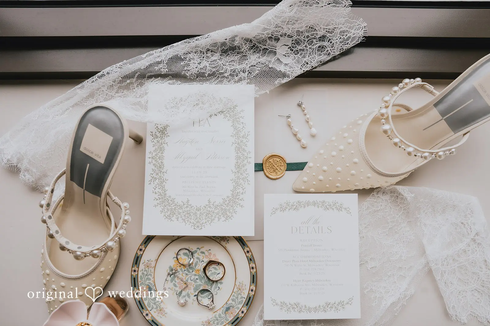 Hayden + Abby A photograph of the wedding invitation suite and other details