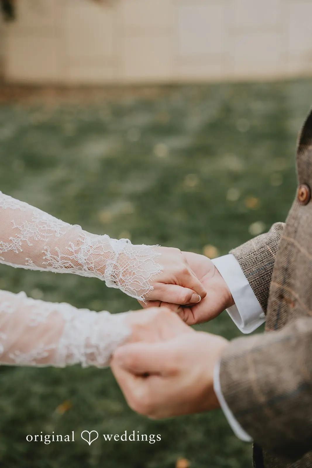 Hayden + Abby close-up shot of the bride and groom holding hands