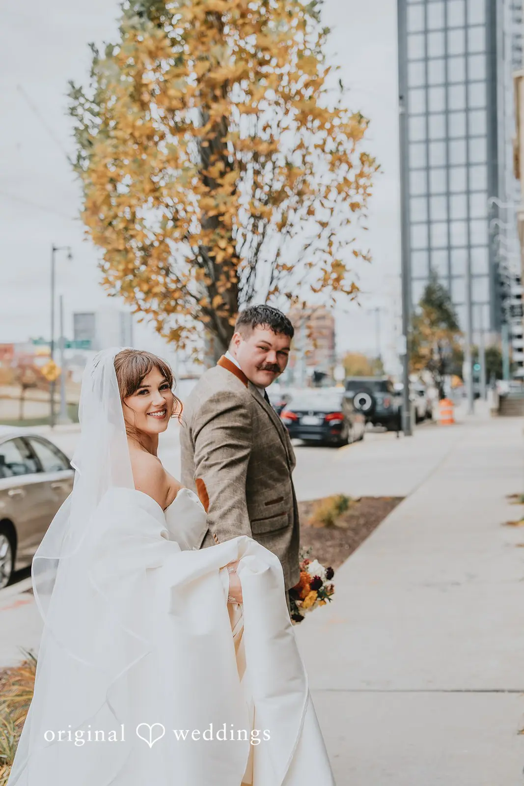 Hayden + Abby gorgeous close shot of bride and groom taking a walk