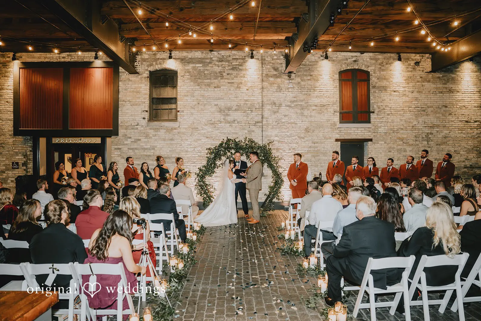 Hayden + Abby Bride and groom exchanging marital vows at Pritzlaff Events wedding ceremony