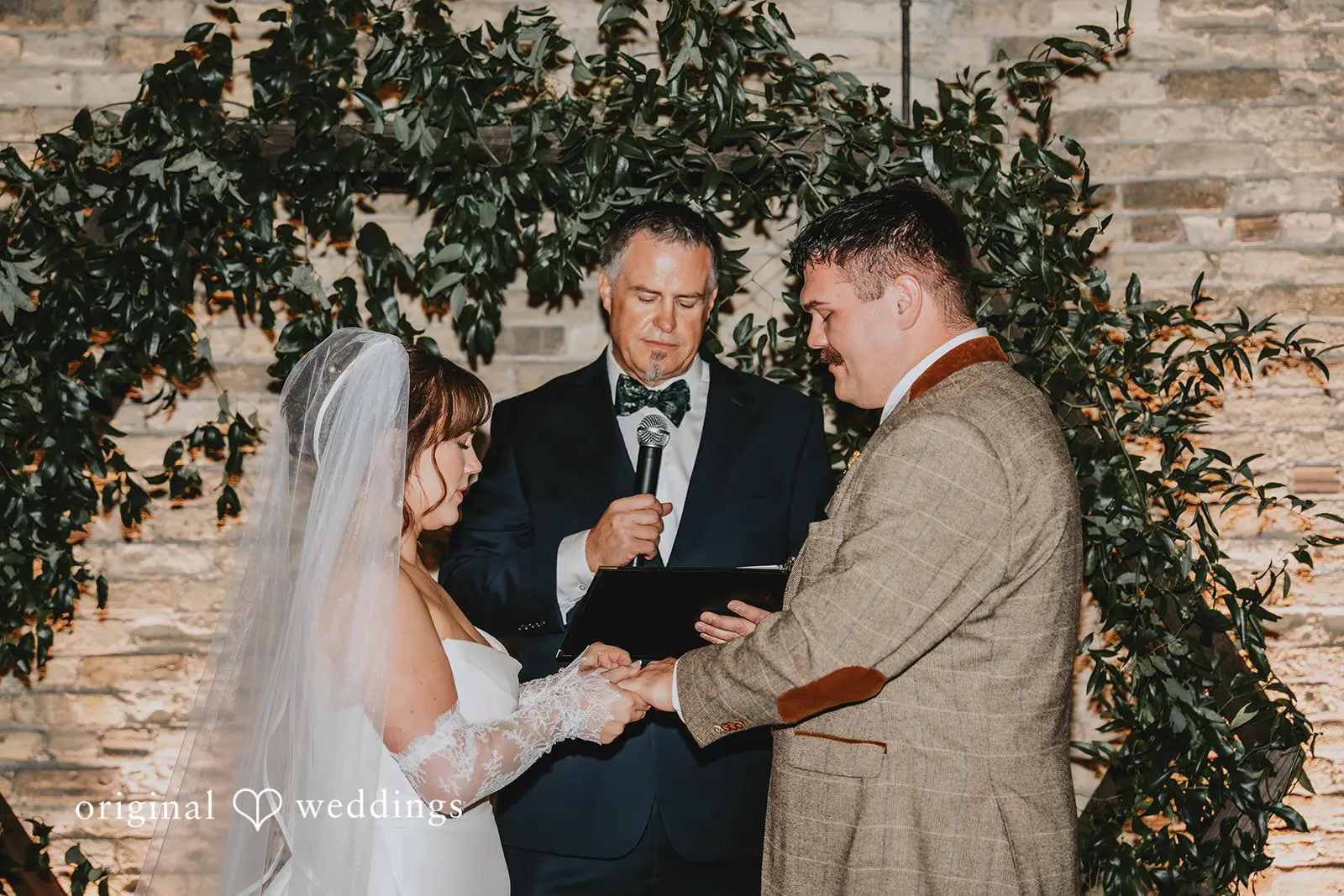 Hayden + Abby Bride and groom exchanging wedding rings at Pritzlaff Events wedding ceremony