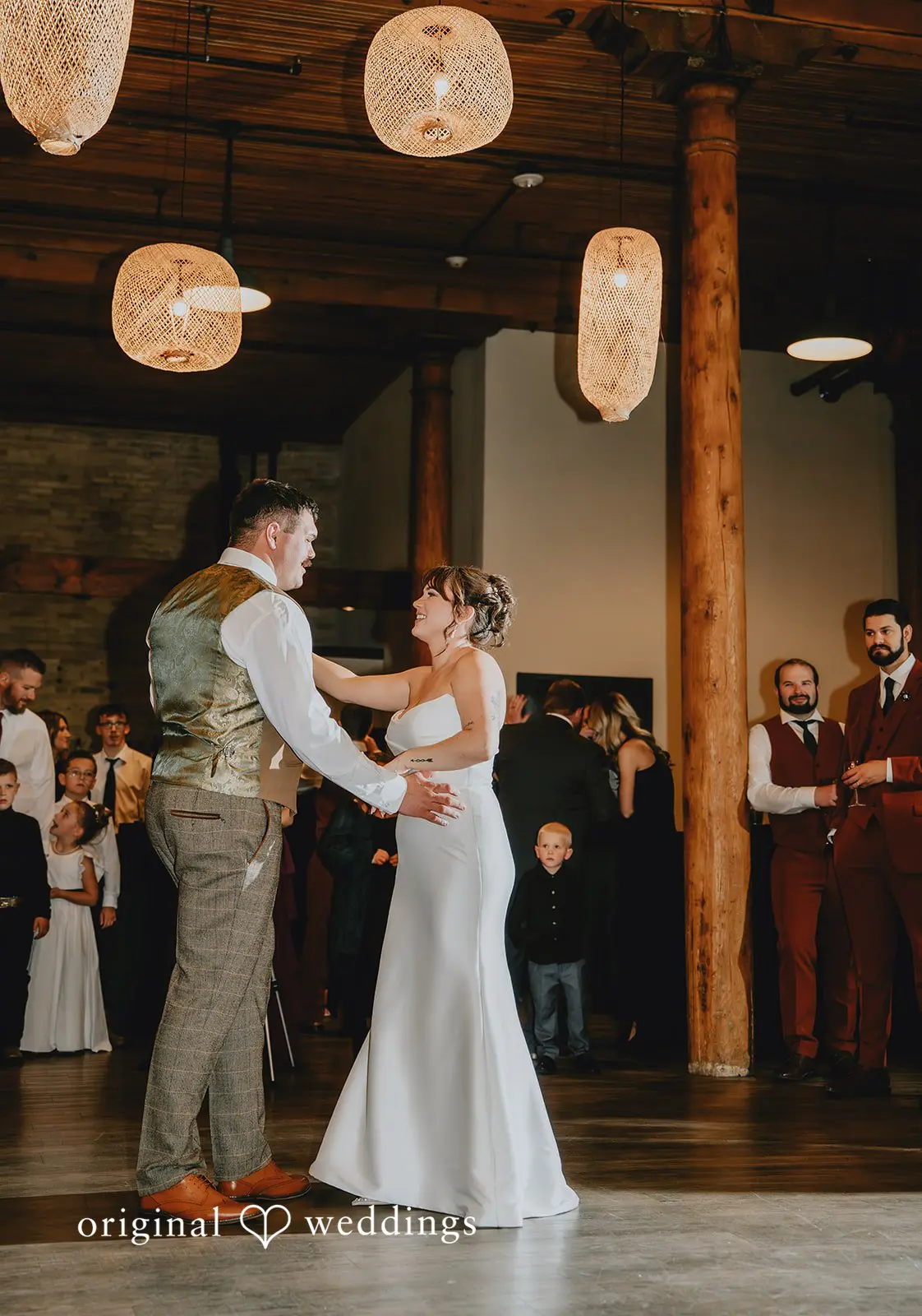 Hayden + Abby Couple dance time beneath the beautiful chandeliers of Pritzlaff Events