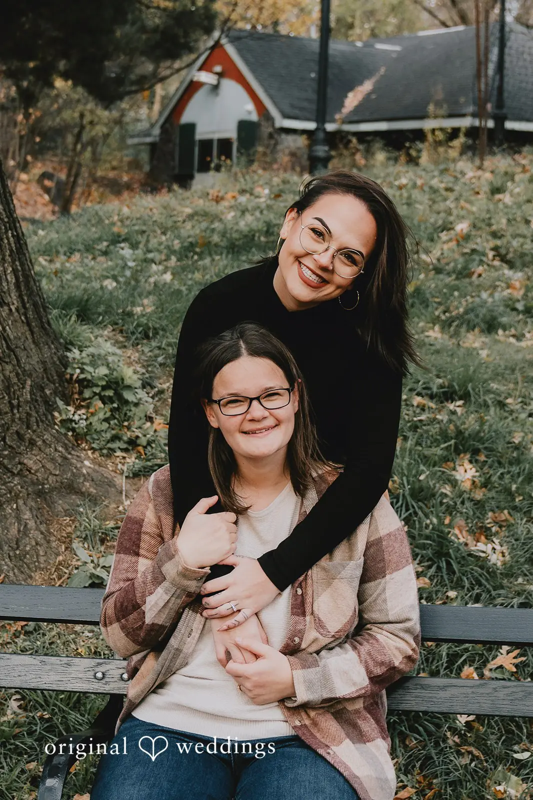 A portrait of the couple in the outdoor area of Prospect Park