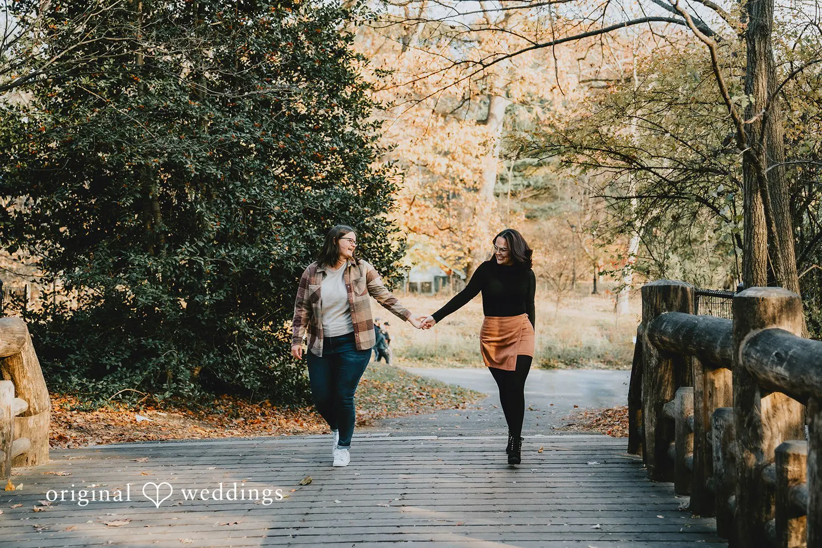 A portrait of a couple taking a walk at Prospect Park