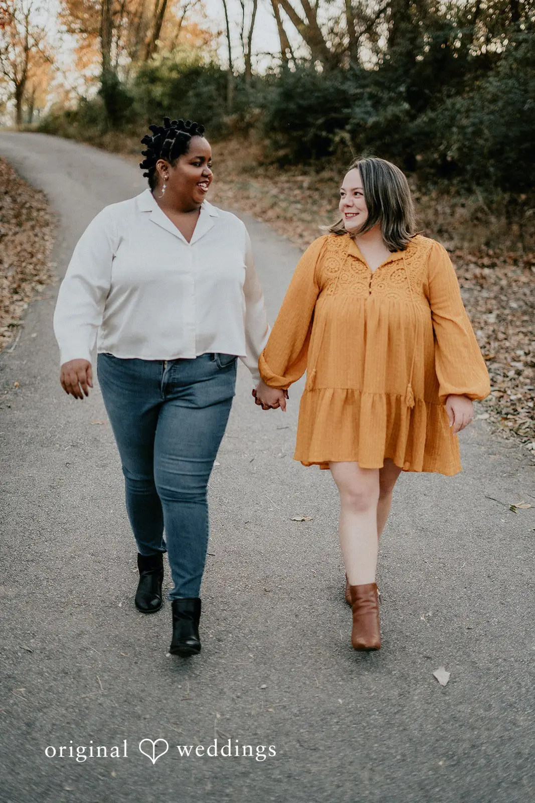 A portrait of the couple taking a walk at Queeny Park