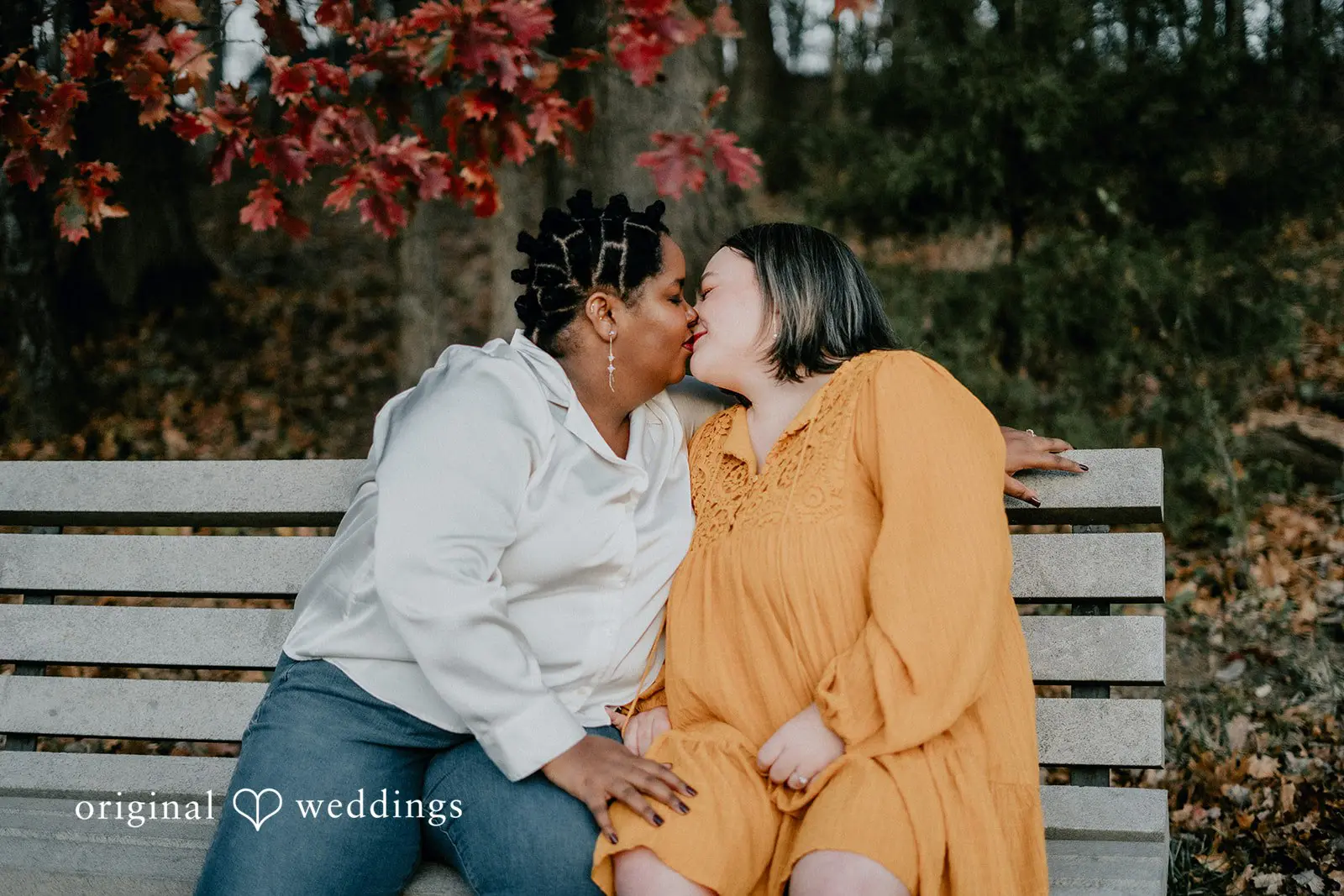 The couple shares a lovely kiss at Queeny Park