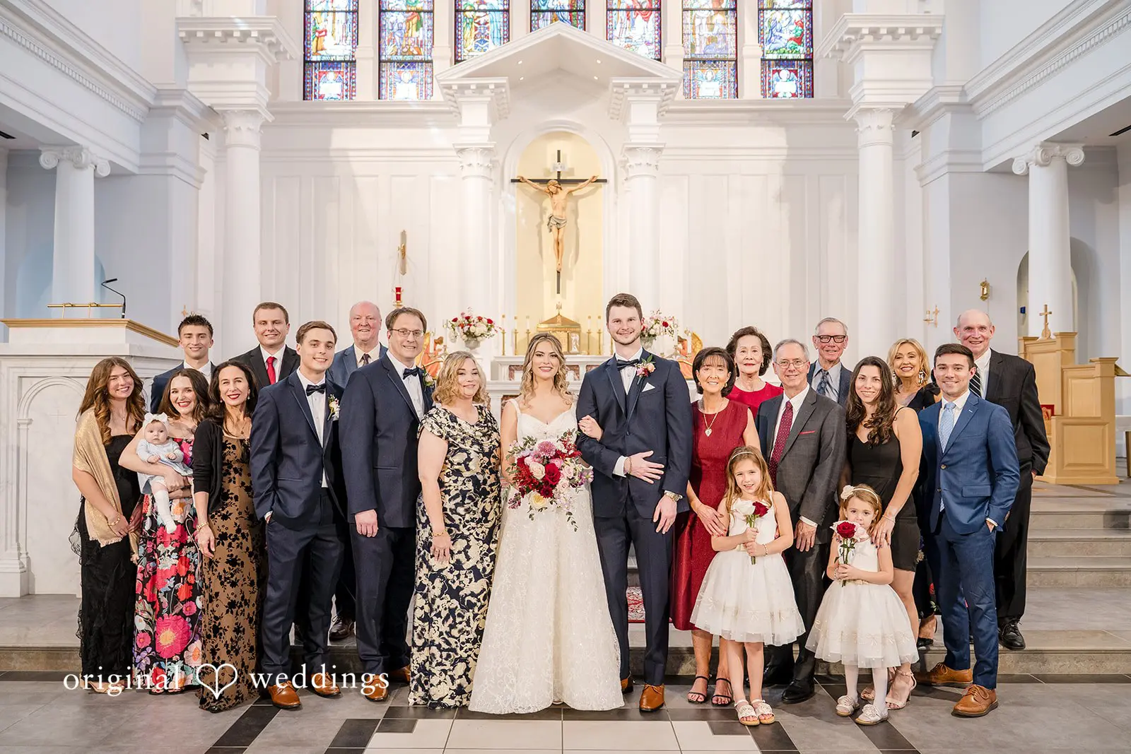 Our Washington DC wedding photographer captured a portrait of the couple with their family