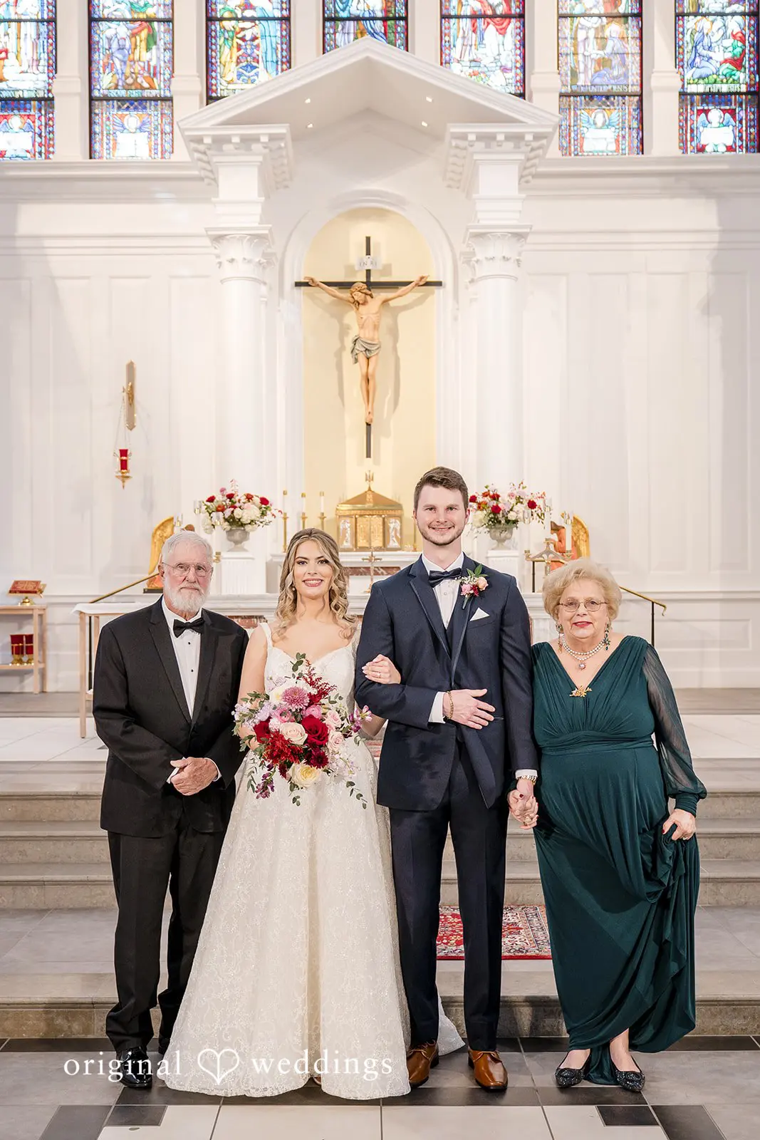 A portrait of the couple with the groom's family