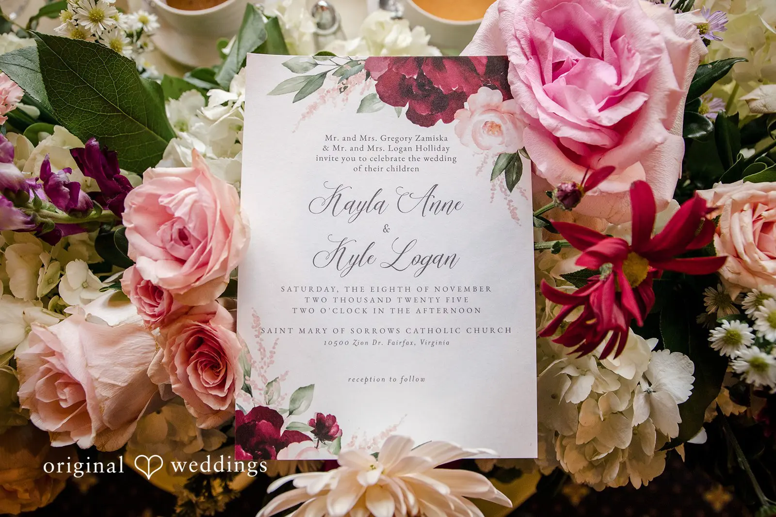 A wedding invitation card with beautiful florals