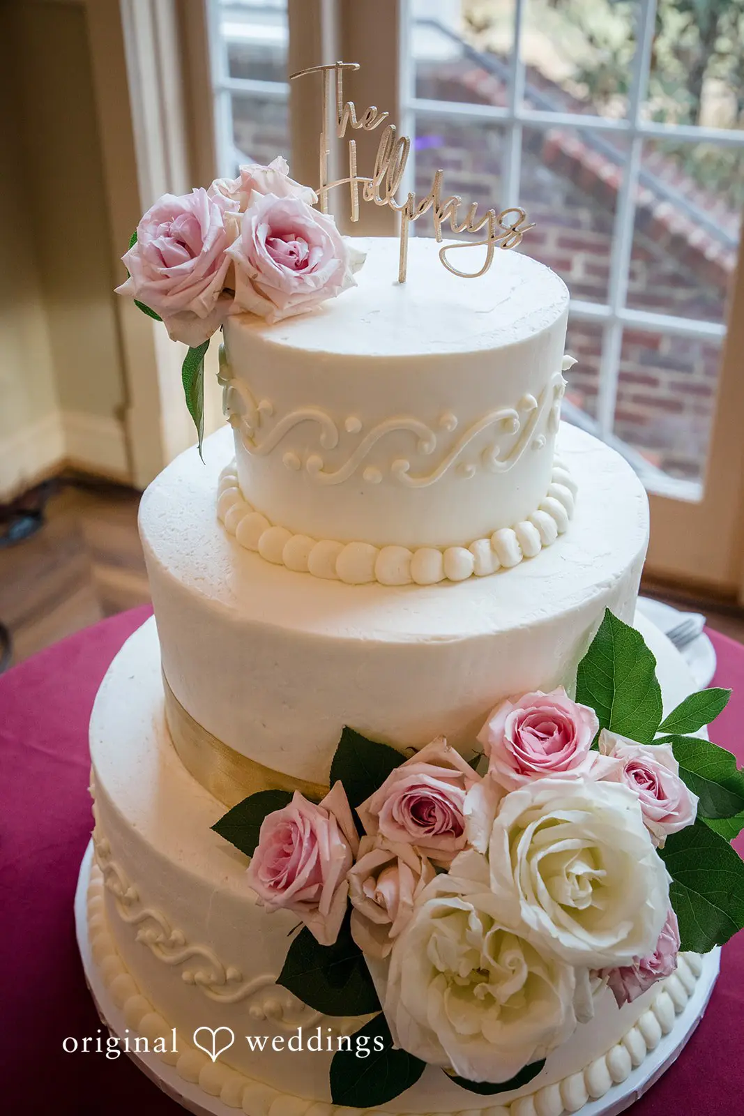 A wedding cake adorned with beautiful florals