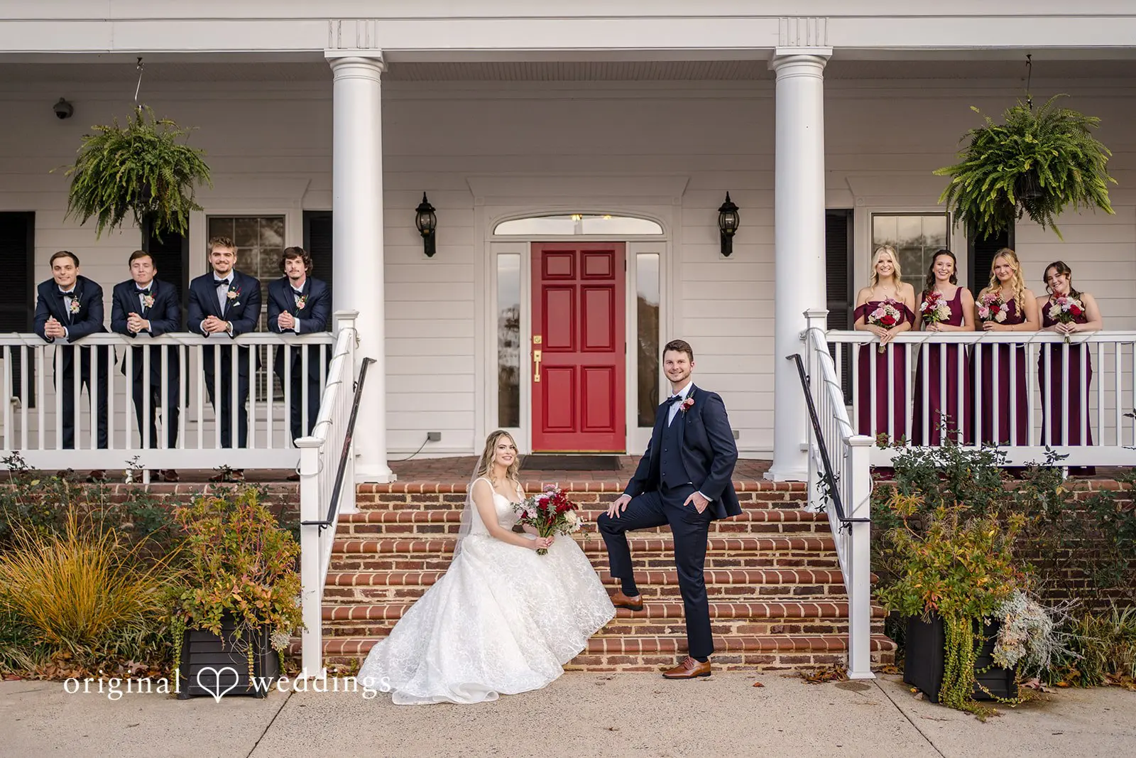 A stylish portrait of the bride and groom with their bridal party