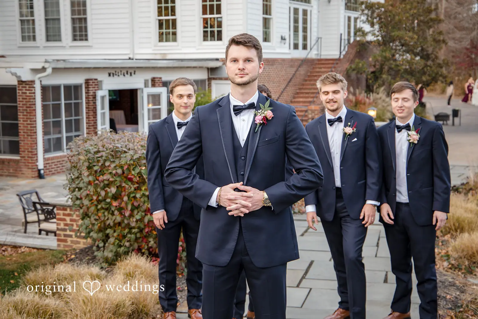A stylish portrait of the groom with his groomsmen