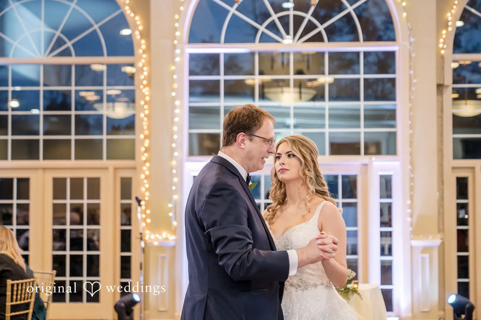 The bride dances with her father