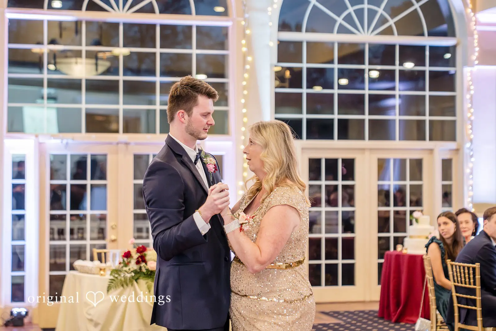 The groom and mother dancing at the wedding reception