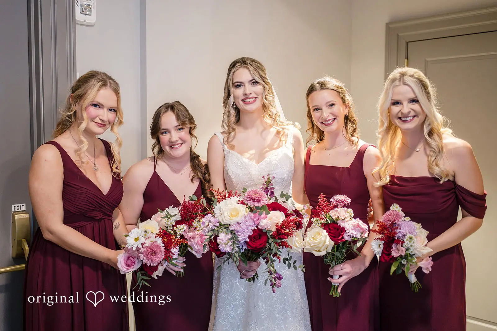 A stunning portrait of the bride and her bridesmaids
