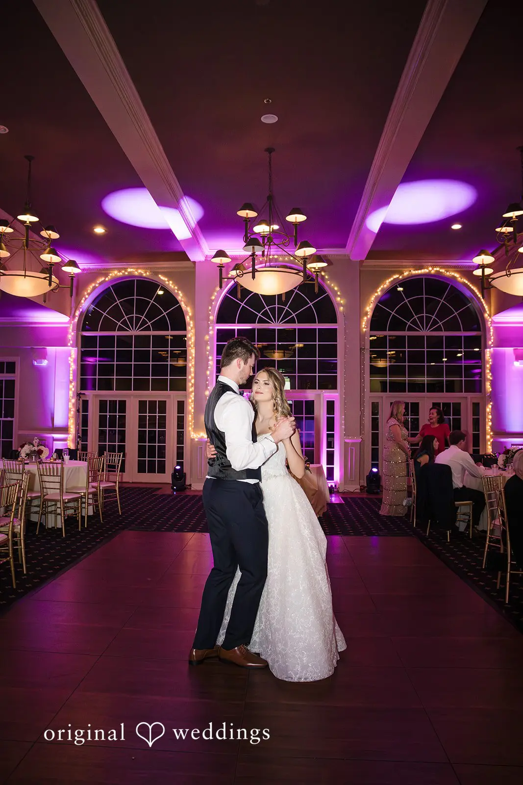 Bride and groom dancing at their wedding reception