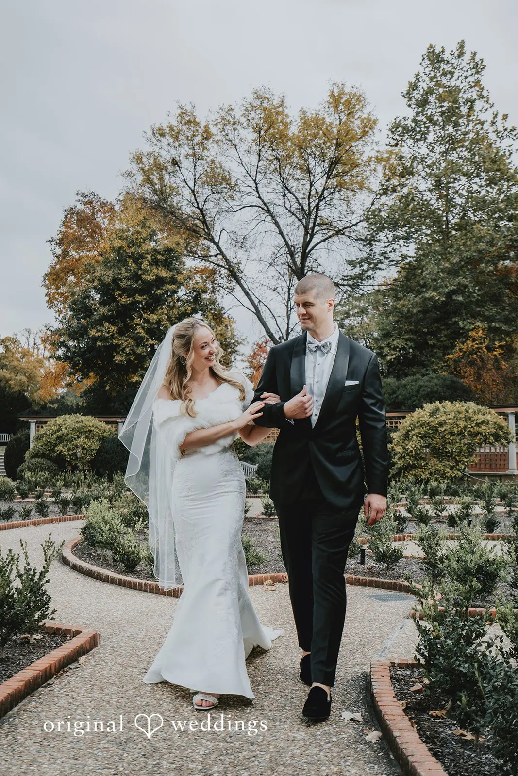 A happy portrait of the bride and groom at St. Louis Botanical Gardens