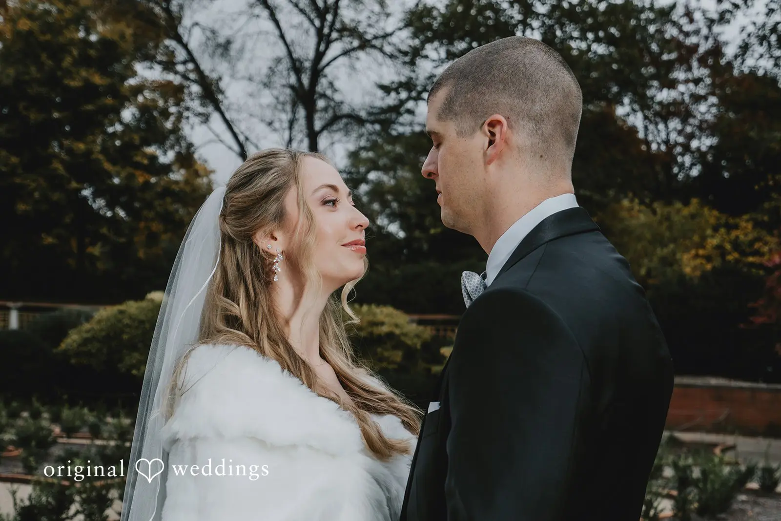 A romantic portrait of the bride and her groom after their wedding ceremony