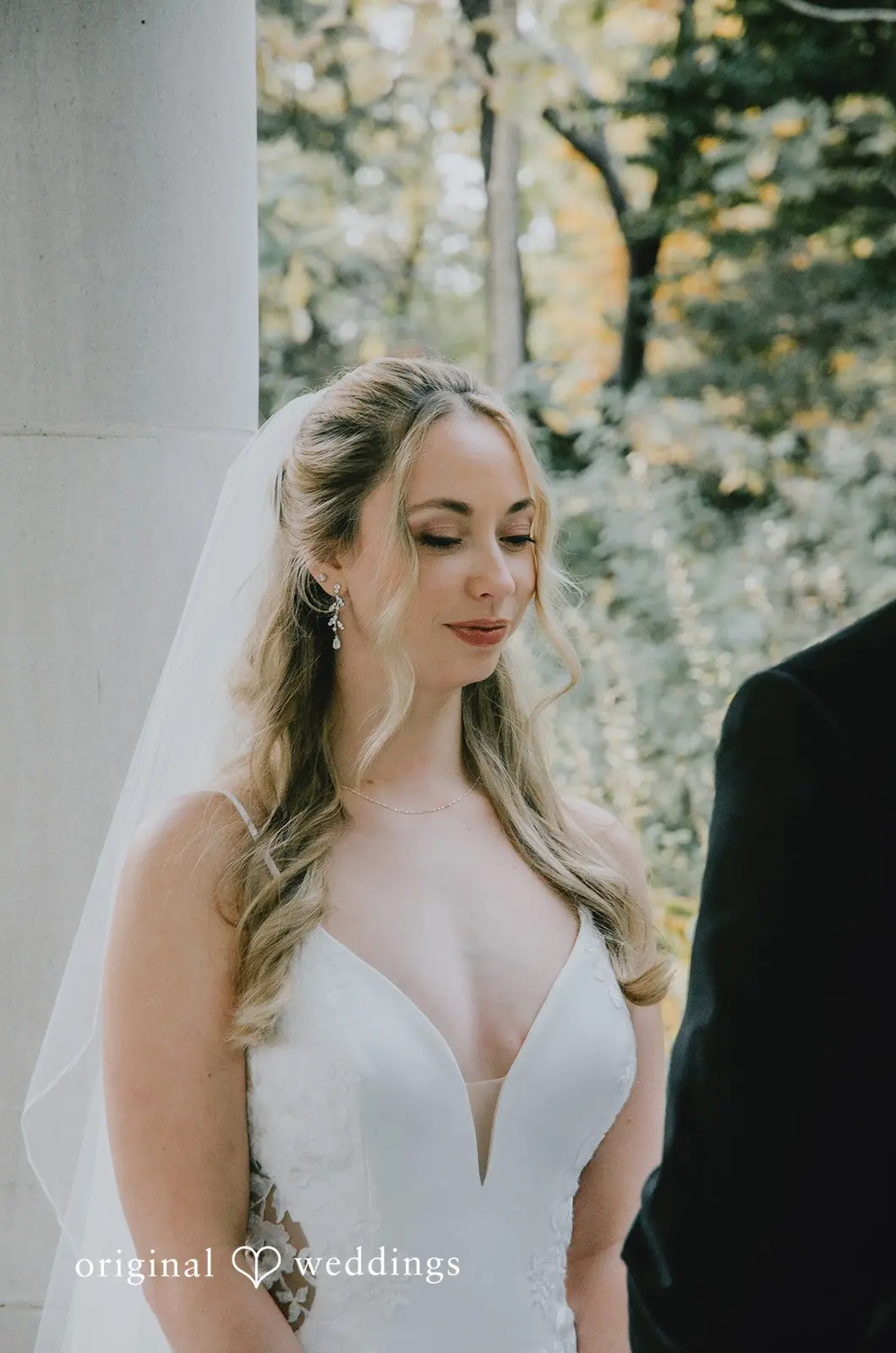 A beautiful portrait of the bride during their marital vow exchange at their Missouri wedding venue