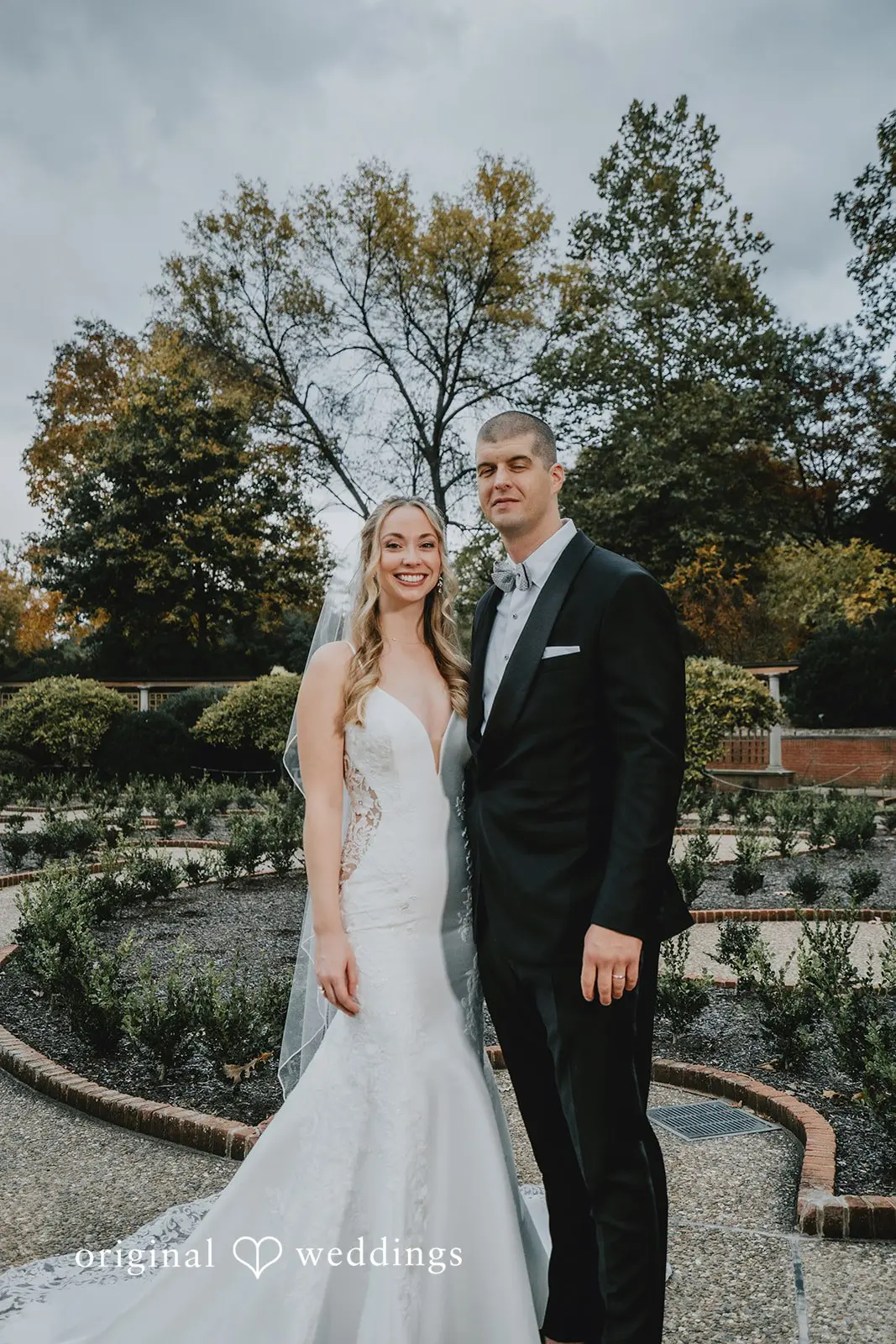A portrait of the couple at St. Louis Botanical Gardens