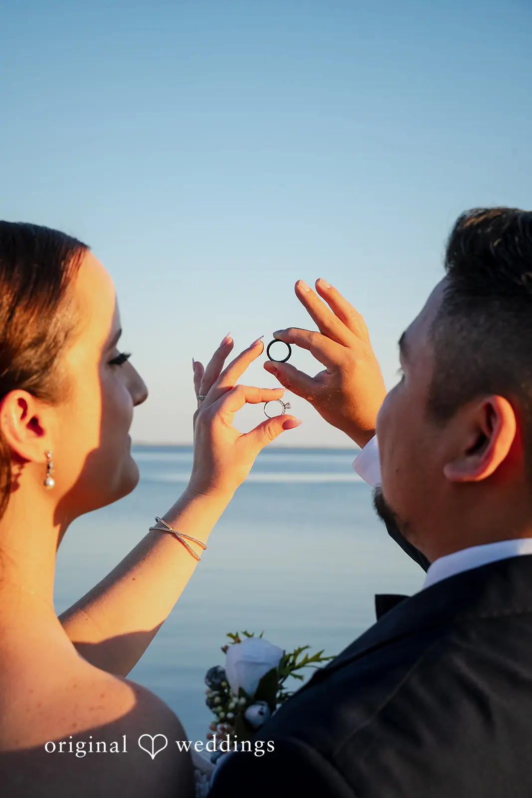 Couple portrait with the Tampa skyline and waterfront in the background