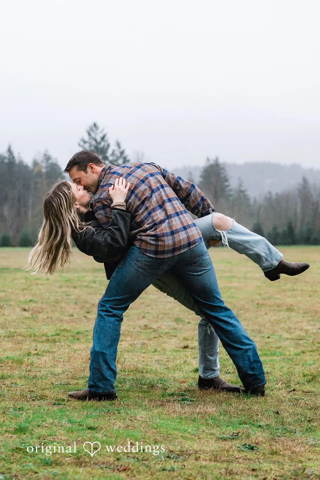 A romantic portrait of the couple in the field that shows their deep connection