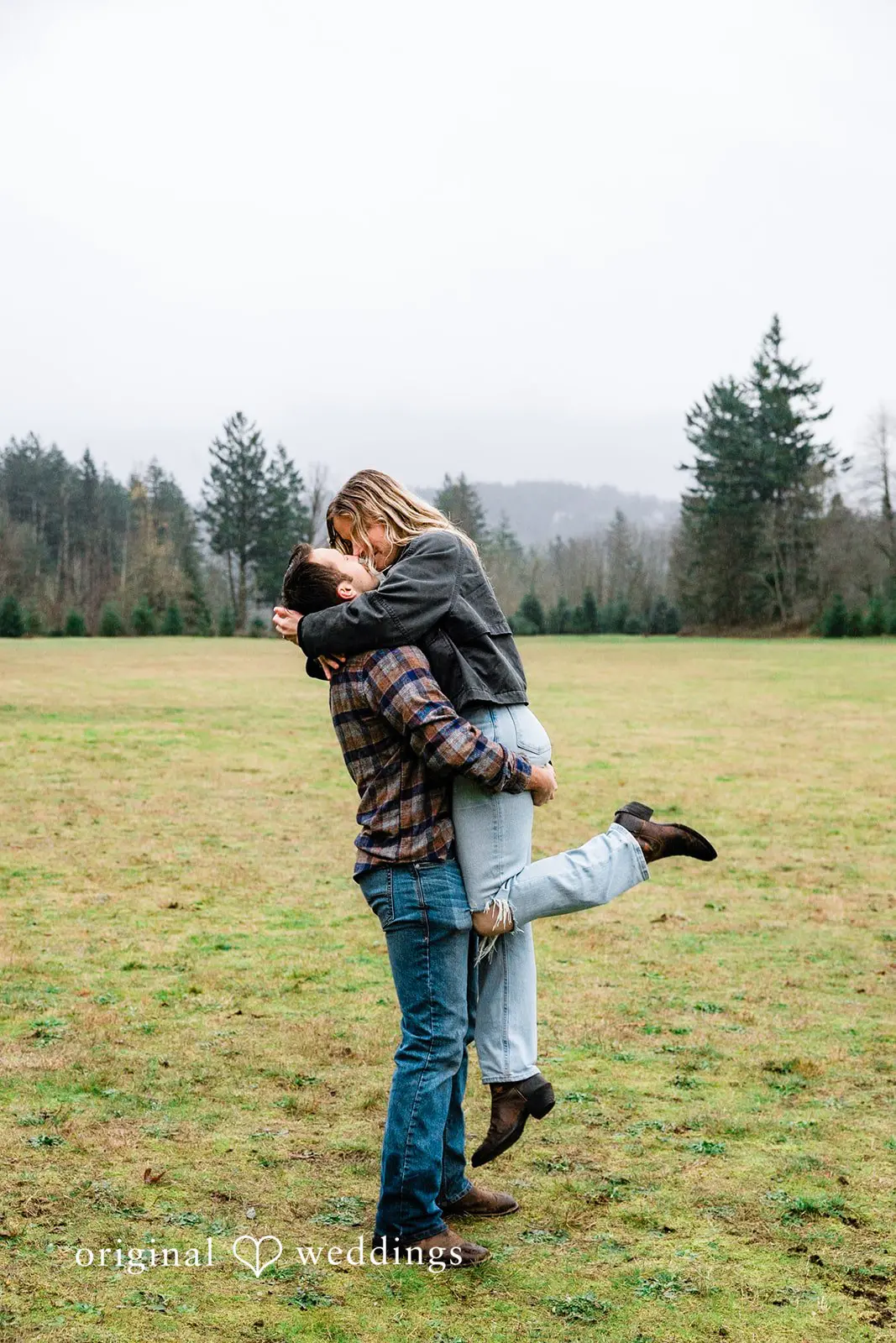 The groom lifts the bride