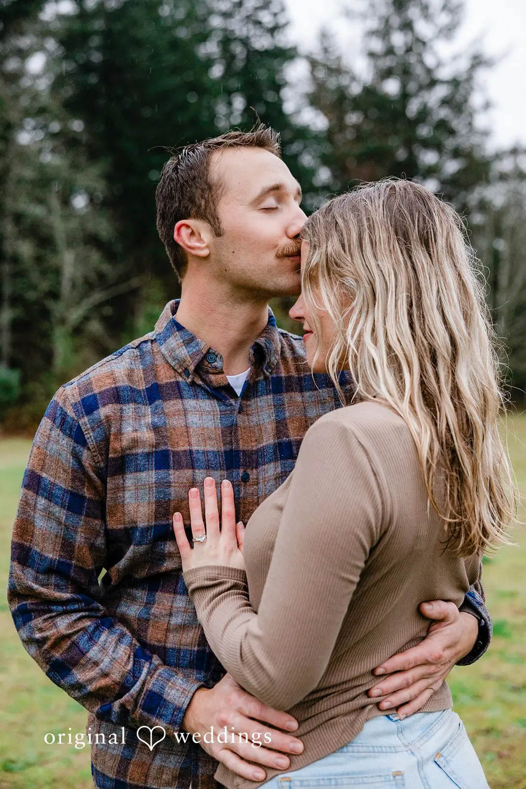 A romantic moment the groom gave the bride a head peck