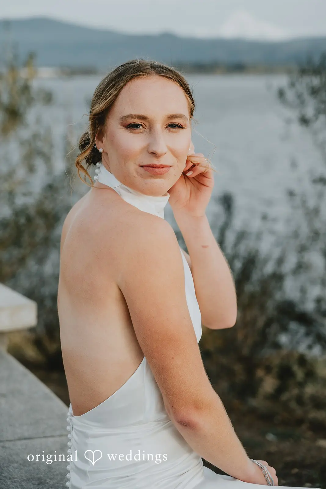 A portrait of the bride at The Black Pearl's bay side