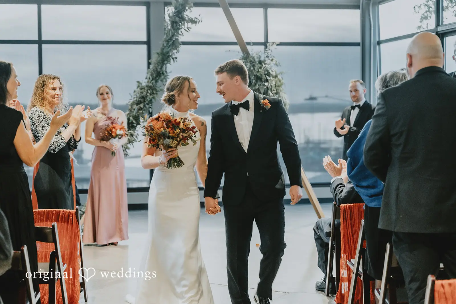 Our Portland wedding photographer at Original Weddings captures a Joyful exit of the couple after The Black Pearl wedding ceremony