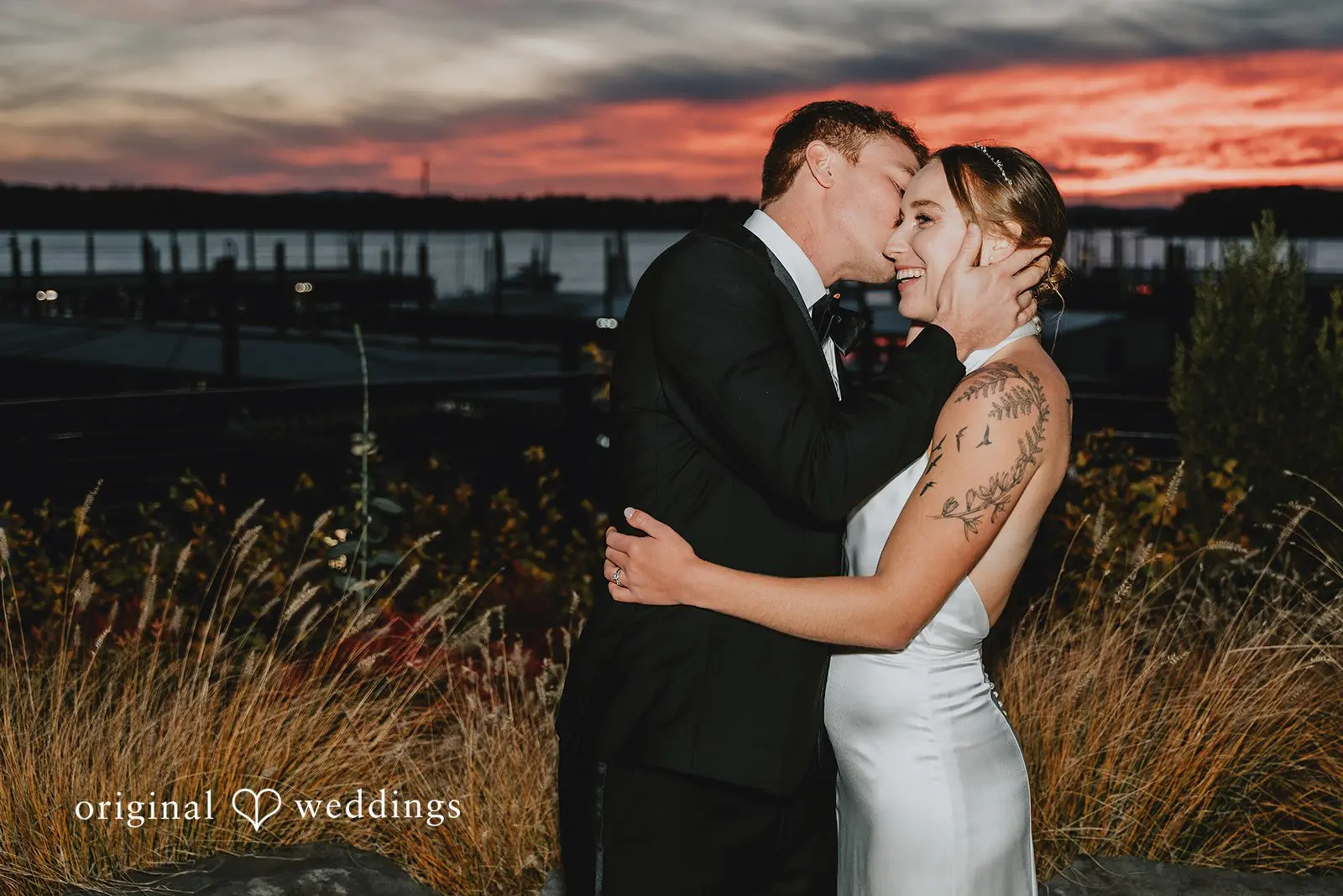 A romantic portrait of the bride and groom after their wedding reception