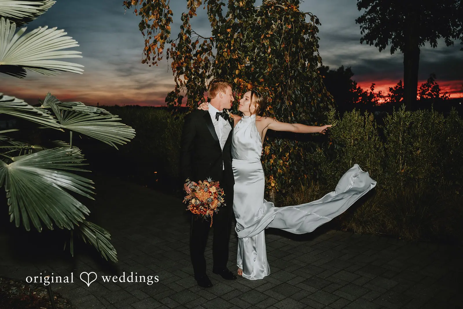 A romantic portrait of the bride and groom at The Black Pearl's outdoors