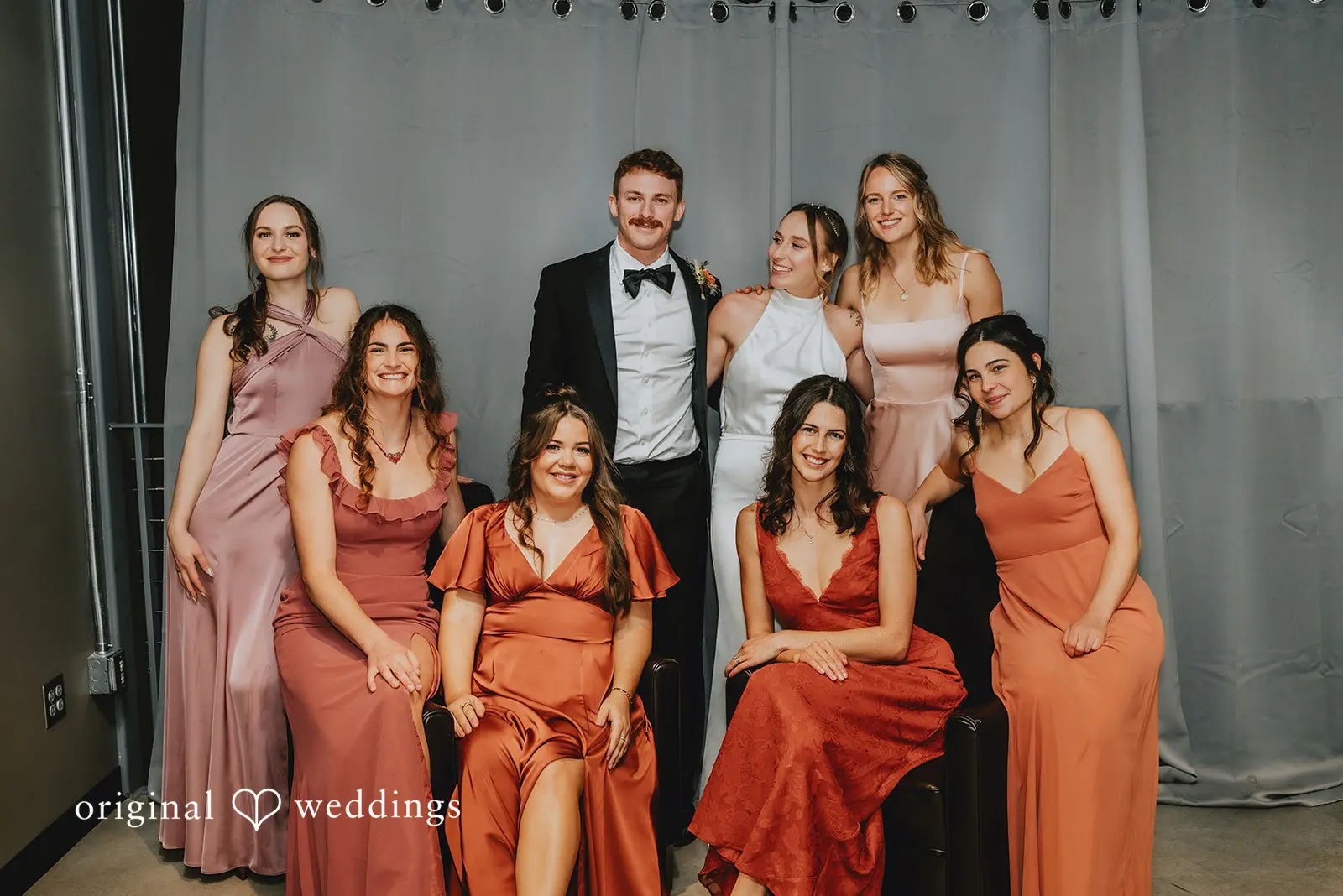 Our Portland wedding photographer captures a stunning portrait of the couple with their bridesmaids