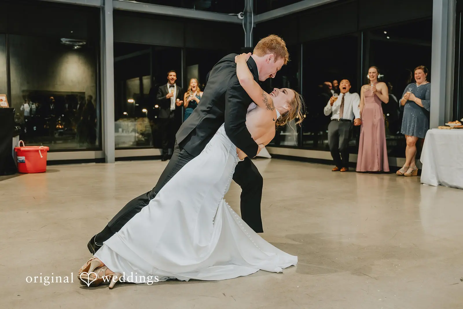 The couple having a romantic dance at the reception