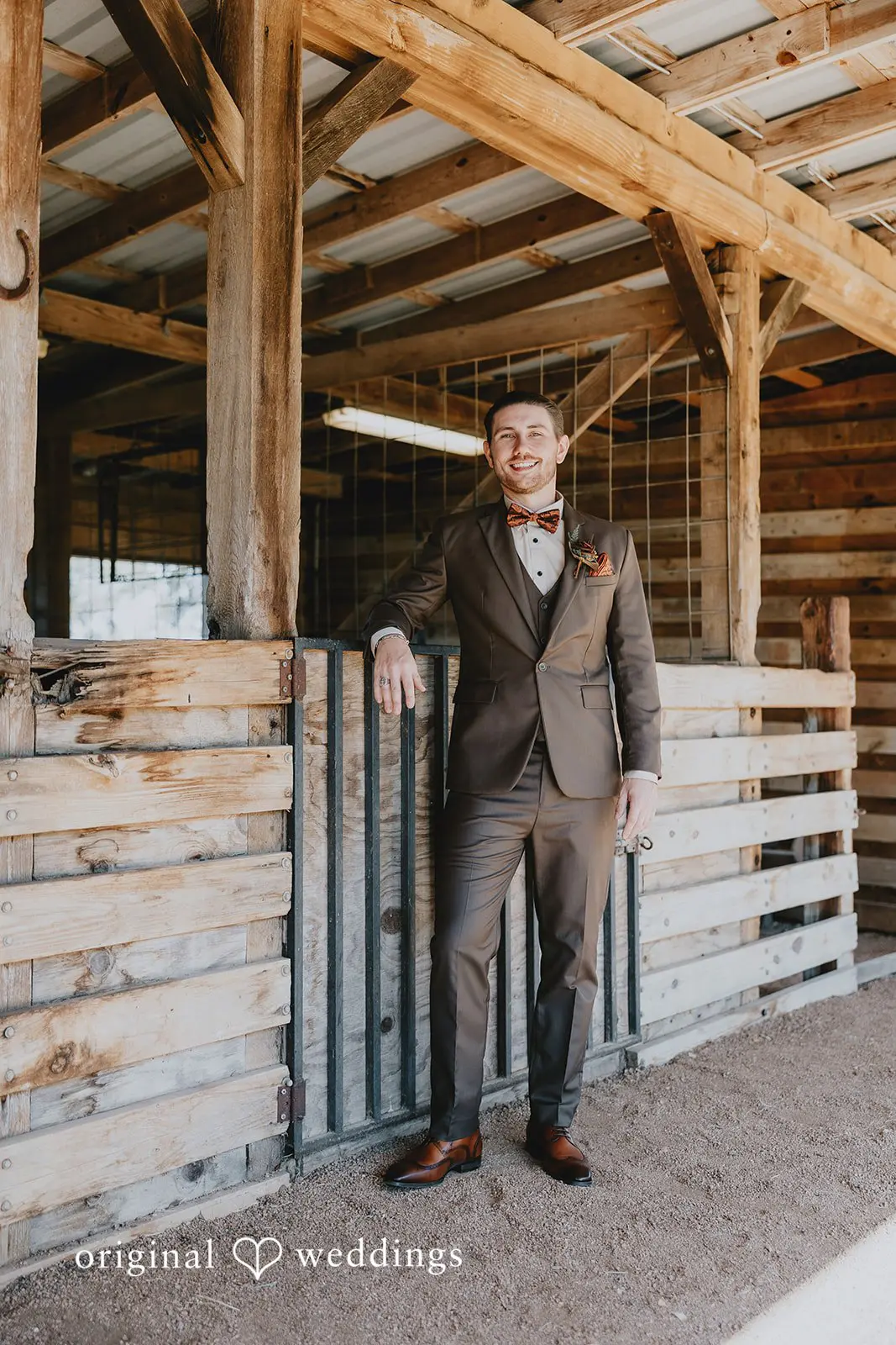 Our Austin wedding photographers capture a stunning portrait of the groom at the ranch