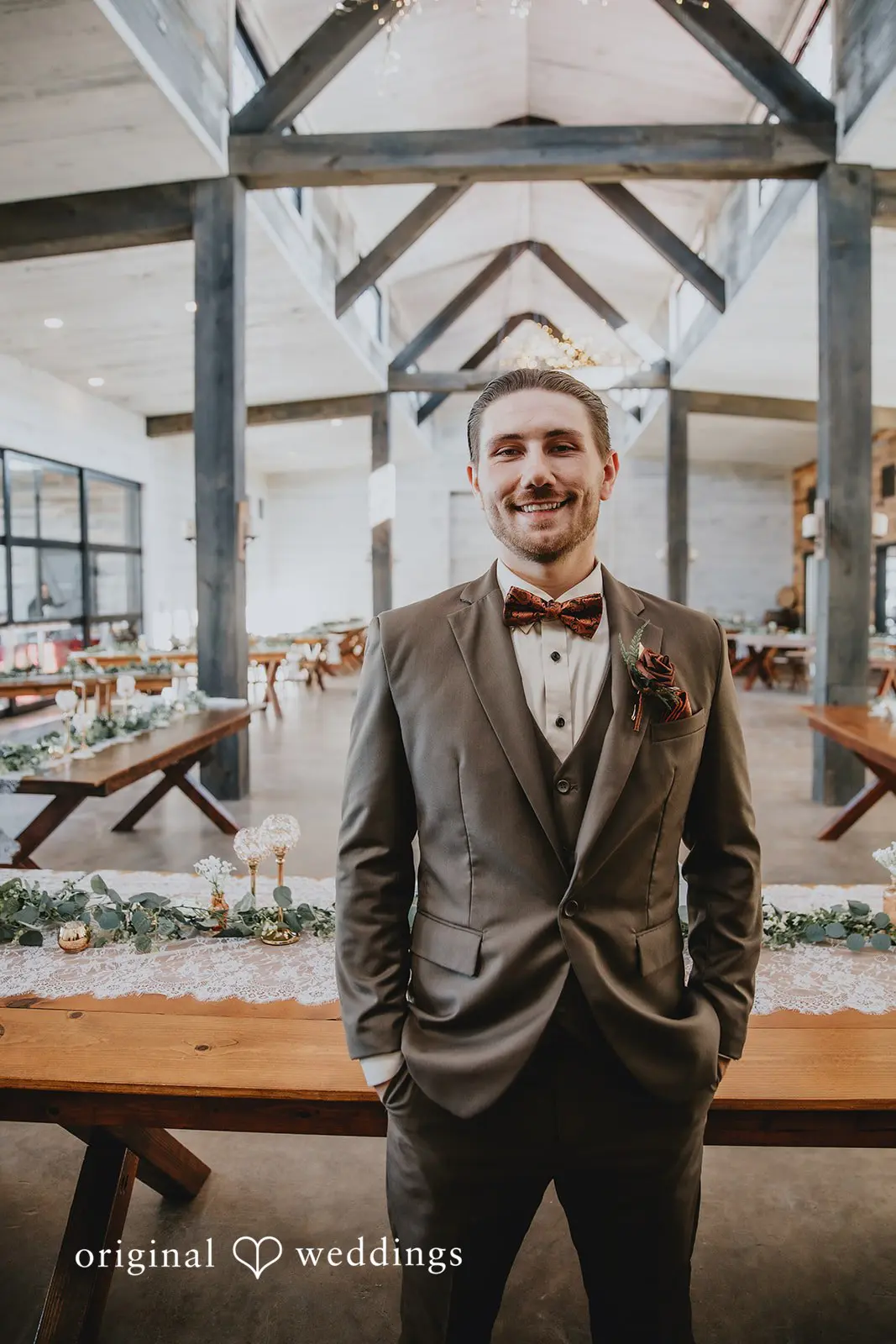 A stunning portrait of the groom at Two Wishes Ranch reception space