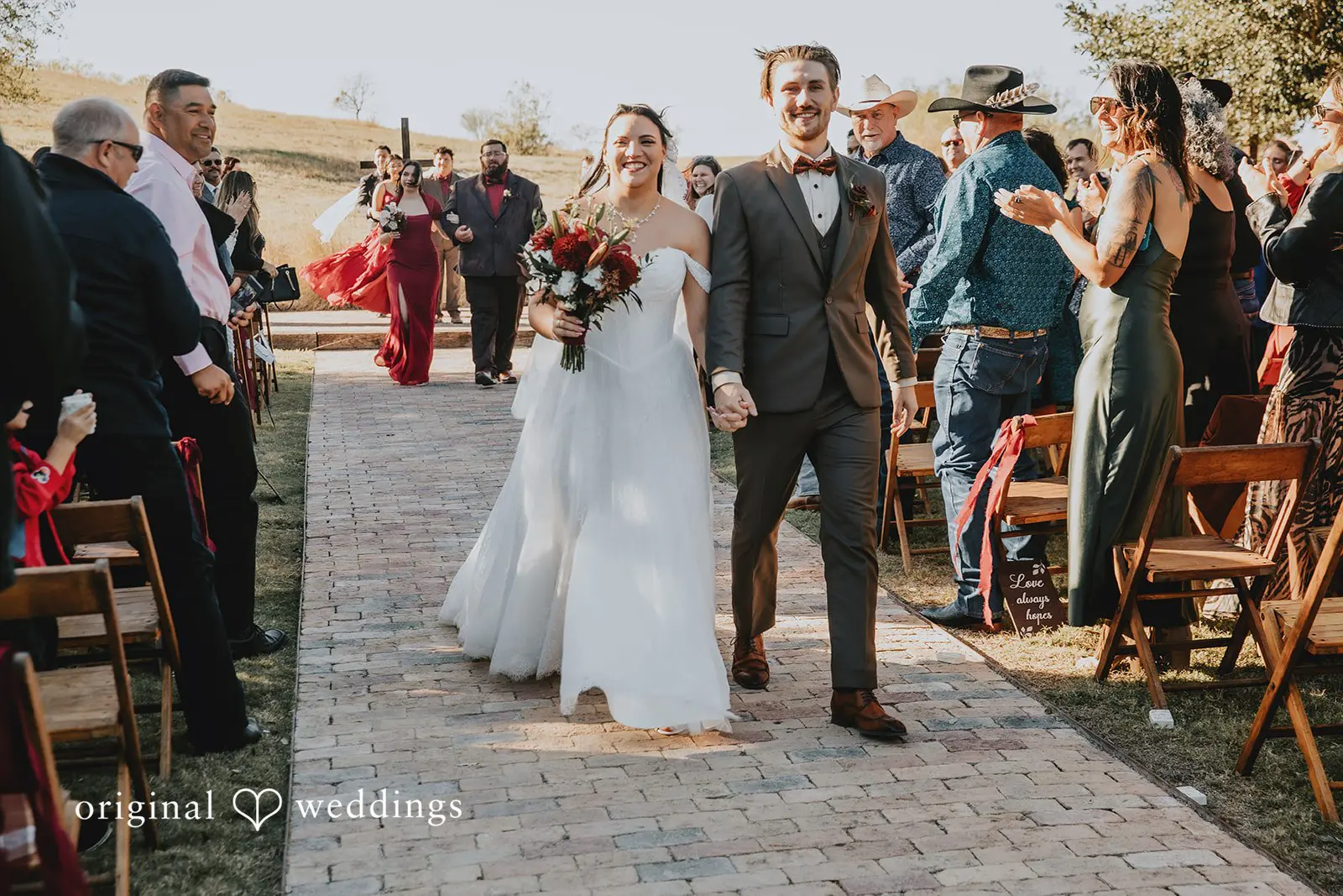 The bride and groom's joyful exit after the ceremony