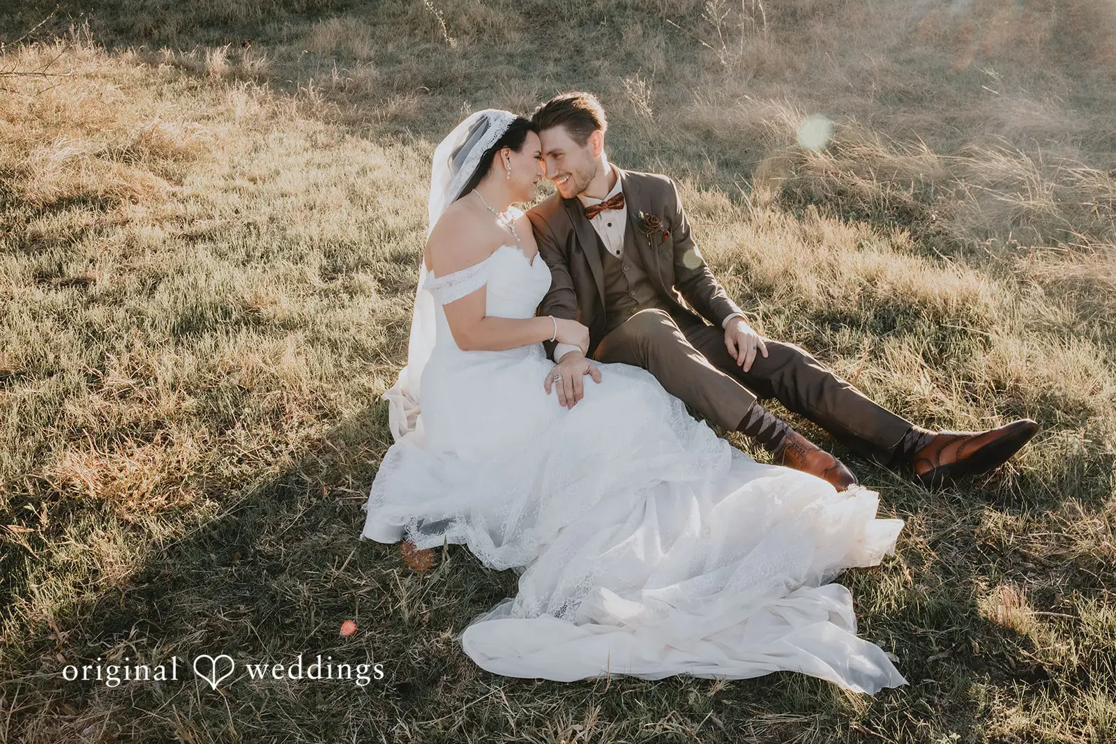 A romantic portrait of the couple at Two Wishes Ranch's field