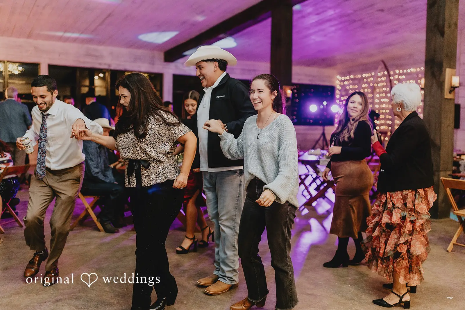Happy guests dancing the evening away