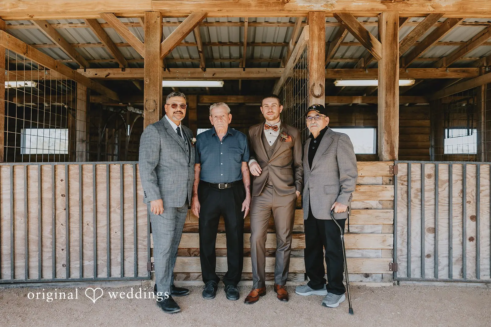 A portrait of the groom with family at Two Wishes Ranch