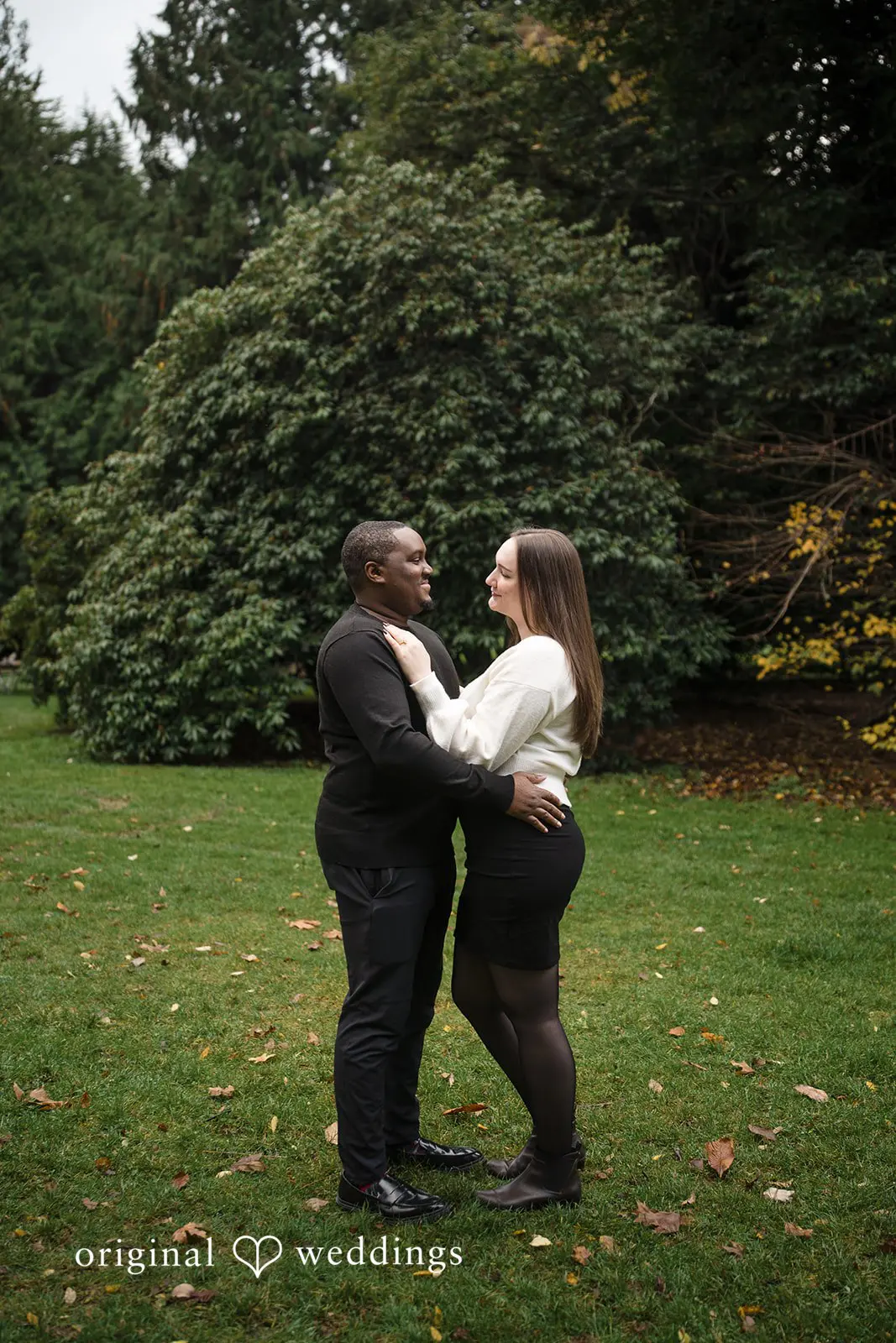 A romantic portrait of the couple at Volunteer Park's conservatory