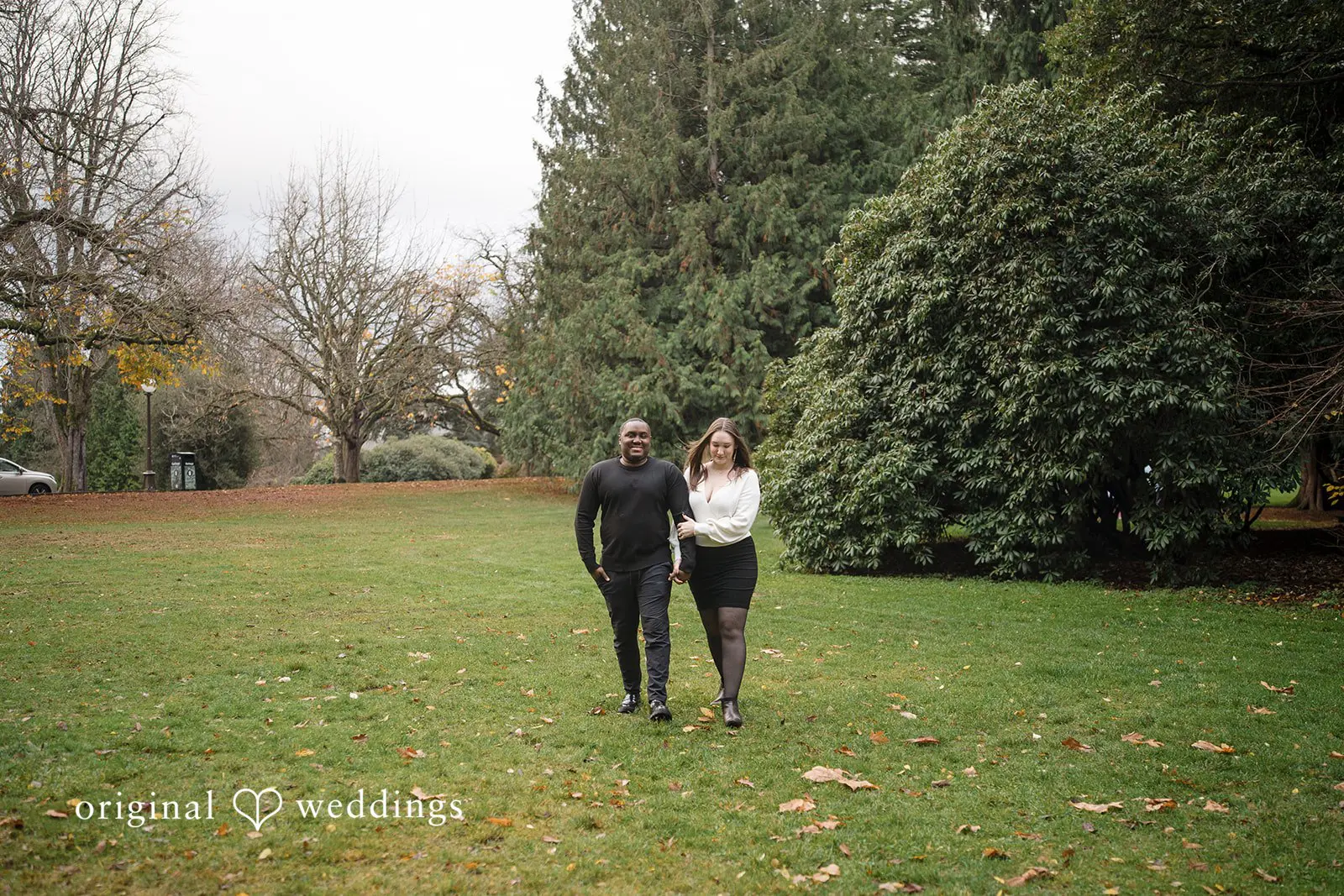 The couple takes a walk in the beautiful outdoor area of Volunteer Park