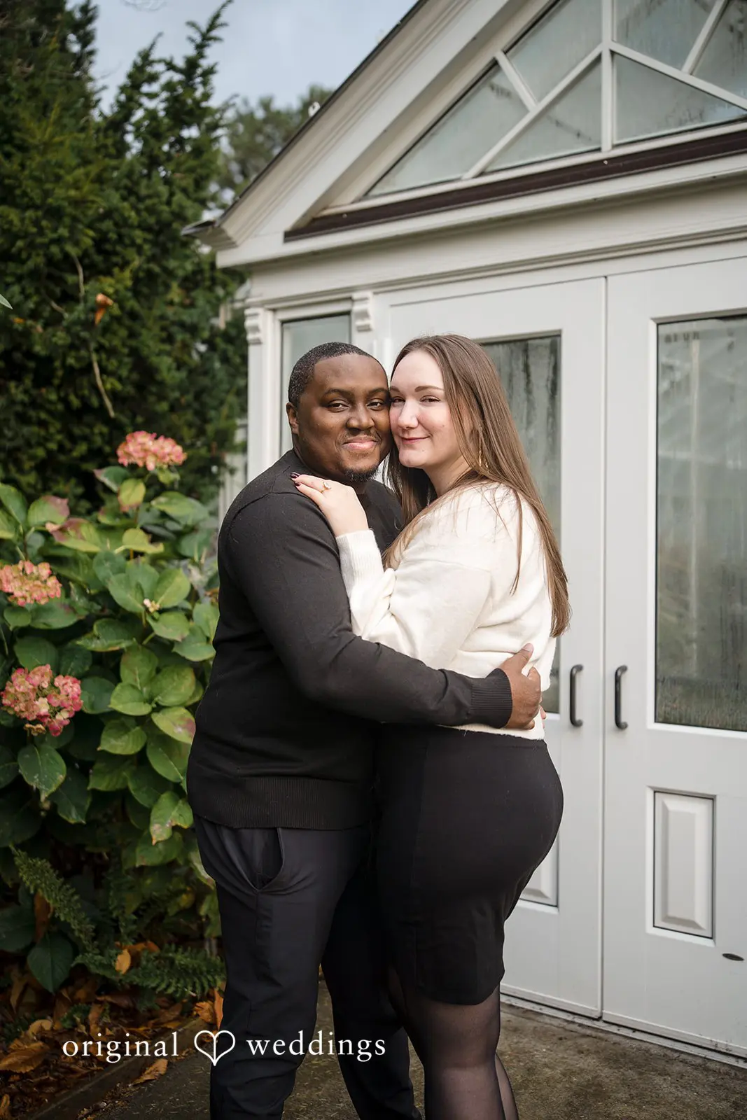 A gorgeous portrait of the couple hugging each other at Volunteer Park