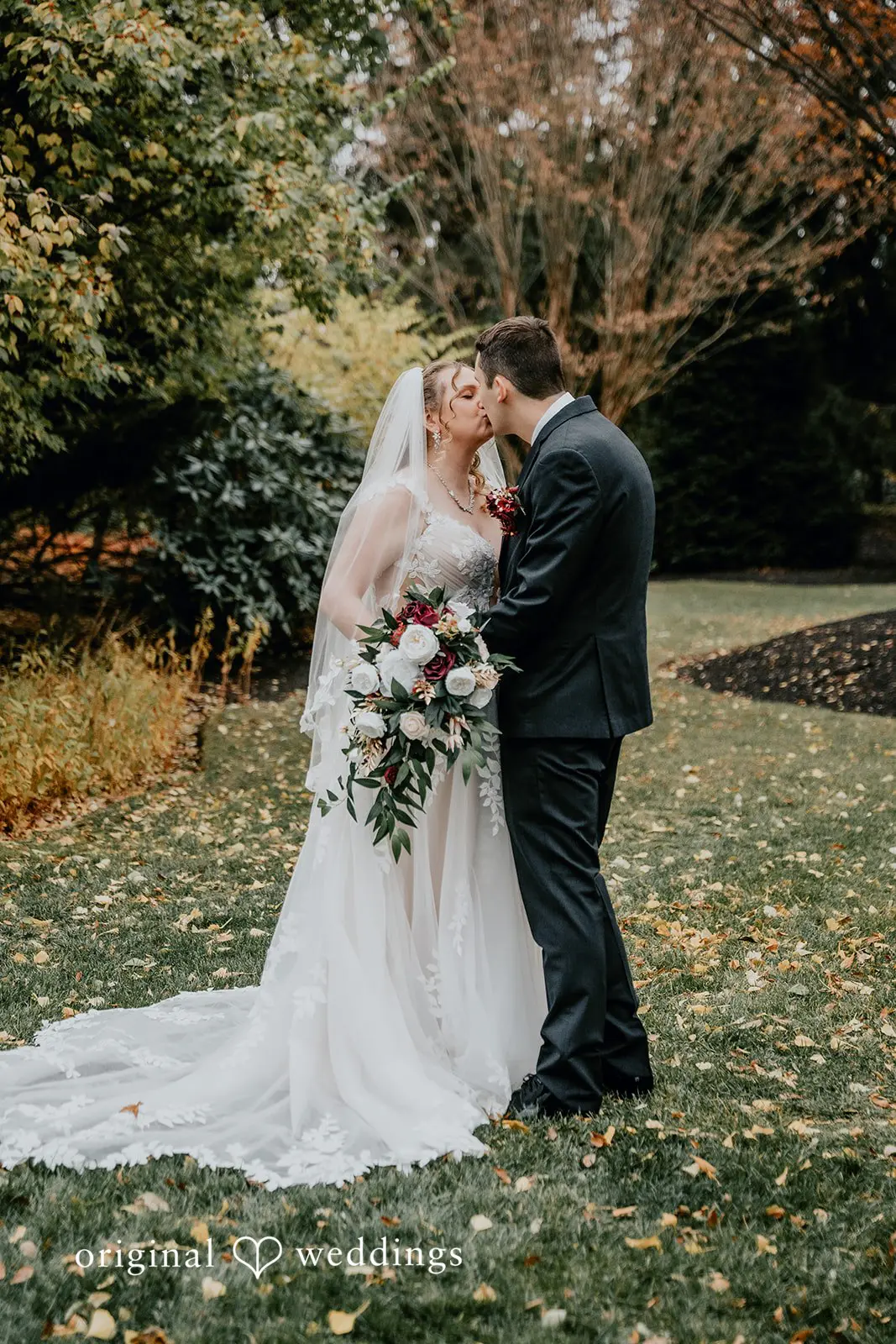 The bride and groom share a kiss