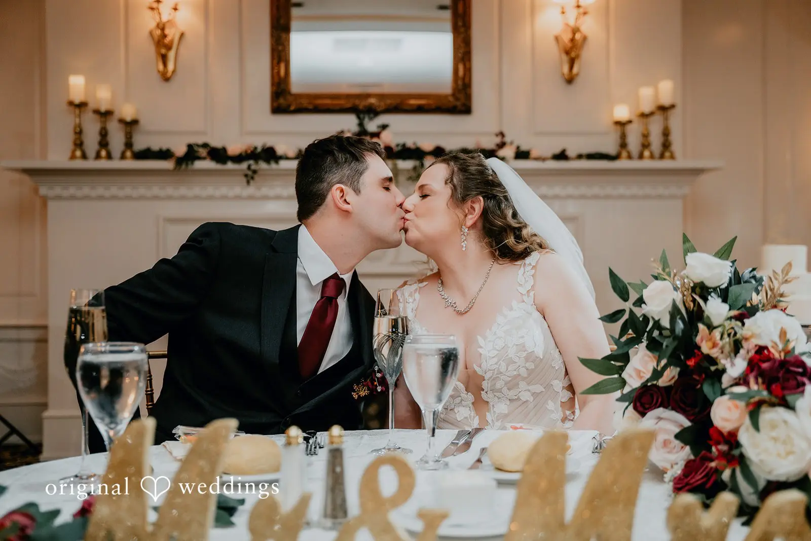 The couple shares a romantic kiss
