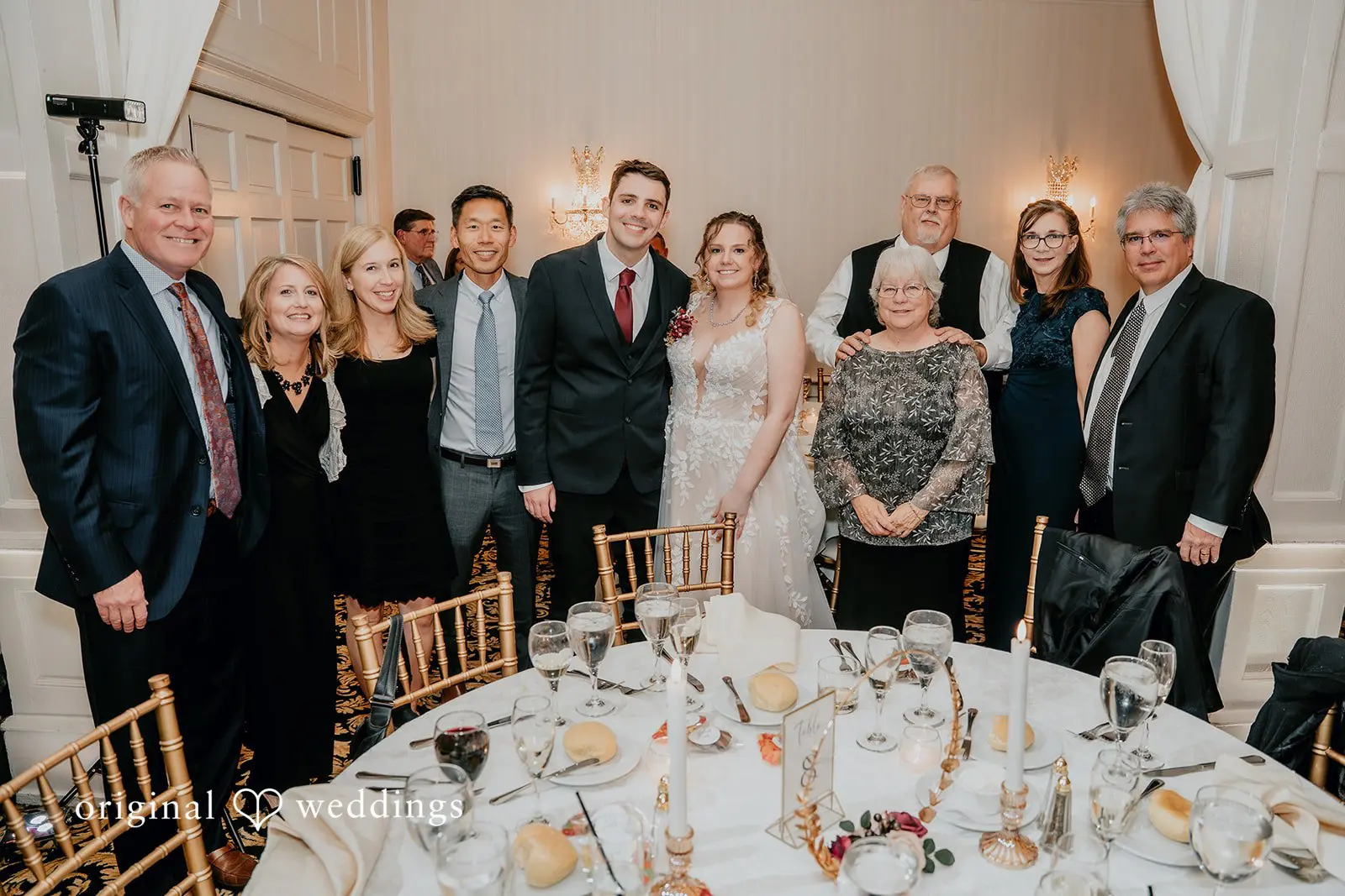 A portrait of the couple with their wedding party